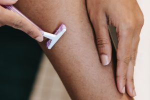 8 Hair Removal Solutions For Women Compared woman shaving legs