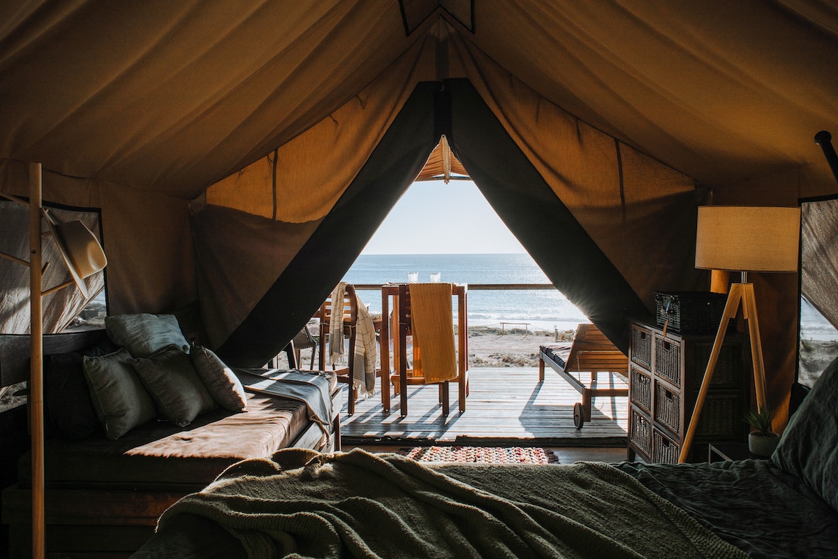 Top reasons people travel glamping on a beach