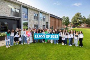 WGS A Levels Class of 2023 with Ms Elizabeth Robinson (left) and Headmistress Mrs Sarah Haslam (right)